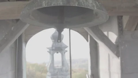 The big old bell moving with tower in background. Slog3 Stock Footage 82337849