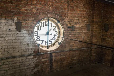Big old clock embeded on the wall Stock Photos