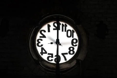 Big old clock embeded on the wall Stock-Fotos