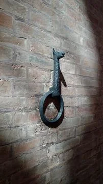 Big old Key on Wall background castle firewall safety Stock Photos