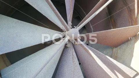 A big old propeller outside the house Stock Photos