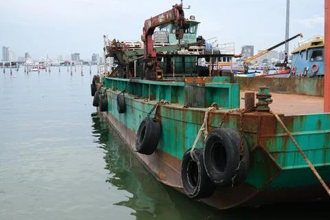 Big old rusty ship at a port Stock Photos