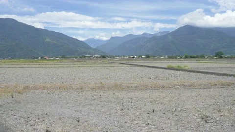 Big open gray fallow land in the countryside Stock Footage 150040533