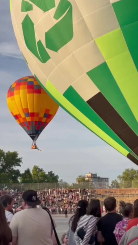 Big orange balloon in the air Stock Footage 248293426