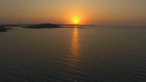 Big orange sun at sunset over sea, aerial view 4k Stock Footage 115721536