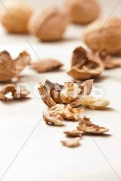 Big organic whole and open walnuts Stock Photos