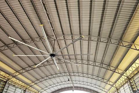 Big outdoor fan on the ceiling. Ilustración de archivo