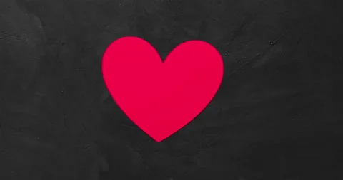 Big paper heart on a stone background like an alarm clock rattles. Stock Footage 146055321