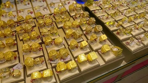 Big Pieces Gold Ring Selection in a Jewelry Shop in Ongpin Street Manila Stock Footage 236181801