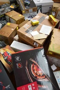 Big pile of many cardboard boxes from electronic products of famous manufactu Stock Photos
