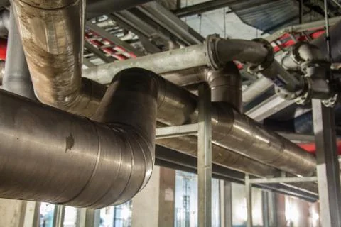 Big pipe under the building Stock Photos