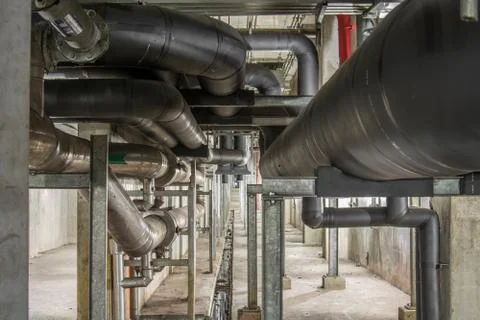 Big pipe under the building Stock Photos