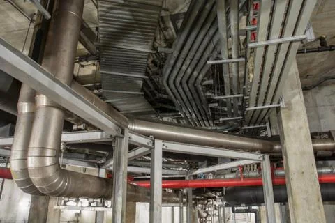 Big pipe under the building Stock Photos