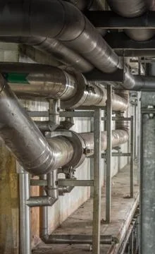 Big pipe under the building Stock Photos