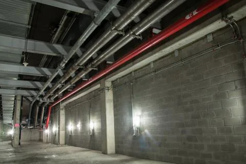 Big pipe under the building Stock Photos