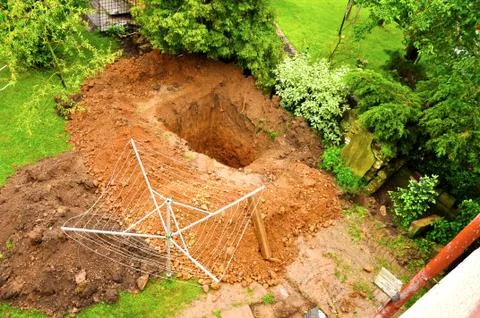 Big pit in the garden Stock Photos