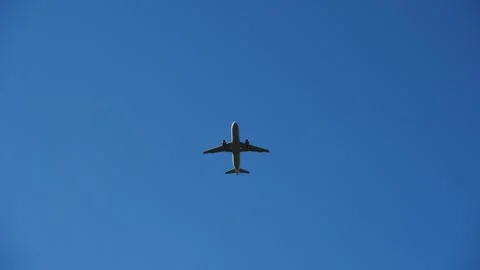 A big plane flies in a clear sky 库存影片 291345440