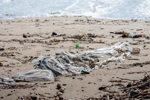 A big plastic bag in the beach Stock Photos