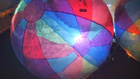 Big plastic bubbles on water for children. Zorbing in swimming pool. Colorful Stock Footage 120592898