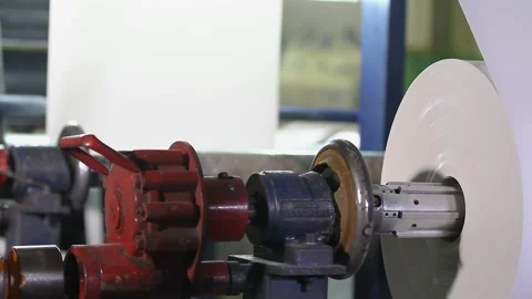 Big plastic reel on an advanced industrial machine Stock-Footage 330192522