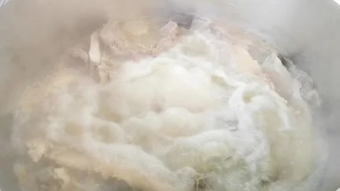 Big pot processing beef soup, boiling beef soup. Stock Footage 161871304