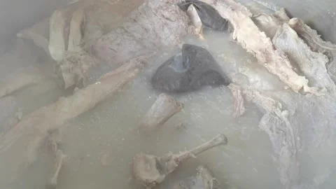 Big pot processing beef soup, boiling beef soup. Stock Footage 161871508