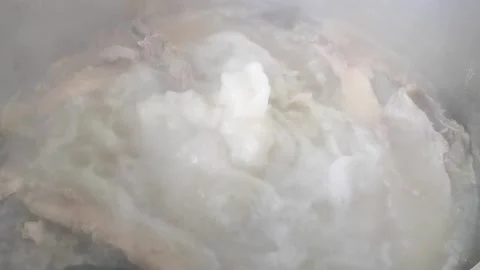 Big pot processing beef soup, boiling beef soup. Stock Footage 161871560