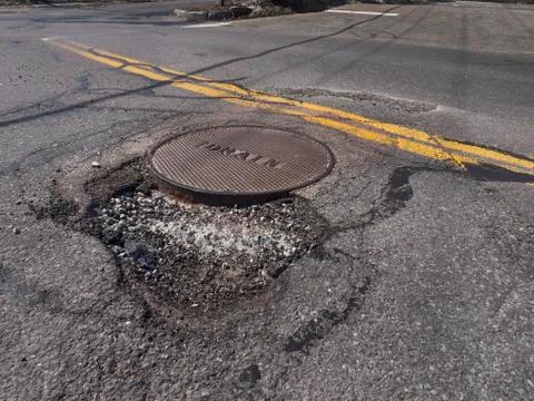Big pothole in road Foto stock