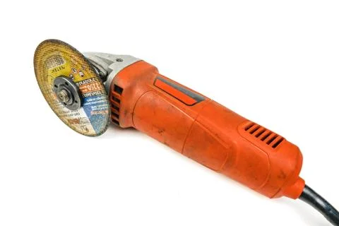 Big powerful angle grinder with abrasive disk isolated on a white background. Foto stock