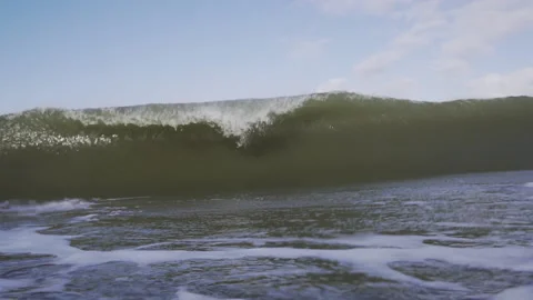 Big powerful wave with a barrel breaking in slow motion 4K Video stock 141901022