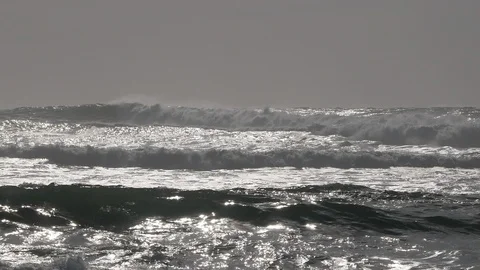 Big, powerful white surf waves on the ocean throwing up spray Video stock 103630659