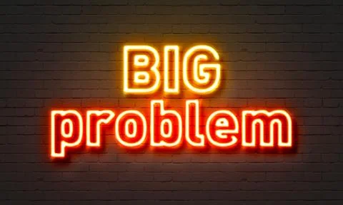 Big problem neon sign on brick wall background. Illustrazione stock