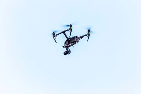 Big professional quadcopter in the sky Stock Photos