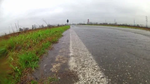 A big puddle and a car Stock Footage 69135513