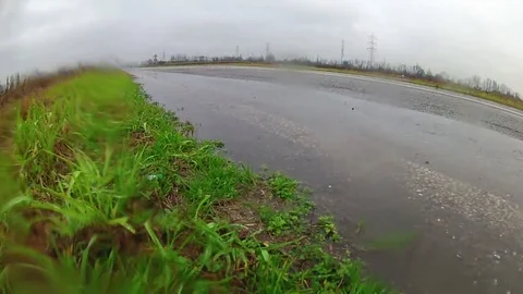 A big puddle and a car Video stock 69136572
