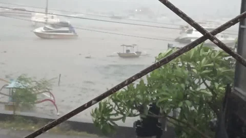 Big rain in bali Stock Footage 232273153