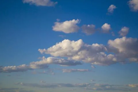 Big rain cloud in the sky during a spring day that will soon bring rain Stock Photos