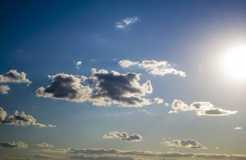 Big rain cloud in the sky during a spring day that will soon bring rain Stock Photos