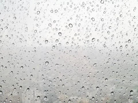 Big rain drops on window Stock Photos