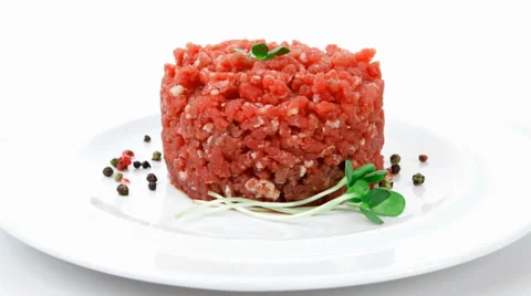 Big raw hamburger cutlet with sprouts Vídeos de archivo 36771363