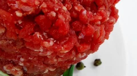 Big raw hamburger cutlet with sprouts Vídeos de archivo 57634464
