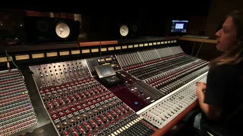 Big recording console with engineer mixing Video stock 10757273