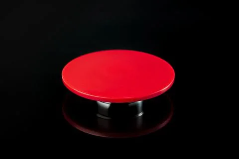 Big red button on a black background. The concept of the use of nuclear Stock Photos