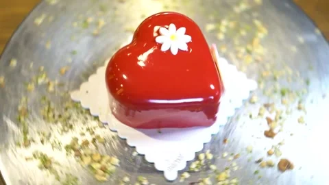 Big red cake in heart shape Stock Footage 167589715