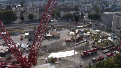A big red crane preparing an old ship for repairs at the shipyard Stock Footage 120987032