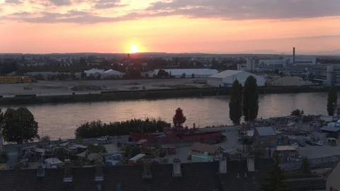 A big red crane preparing an old ship for repairs at the shipyard Stock Footage 120994730