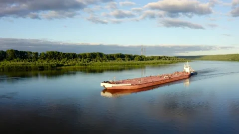 A big red ferry floats down the river Video stock 157798337
