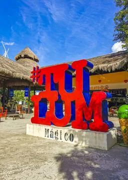 Big red sign lettering writing Tulum Magico in Mexico. Stock Photos