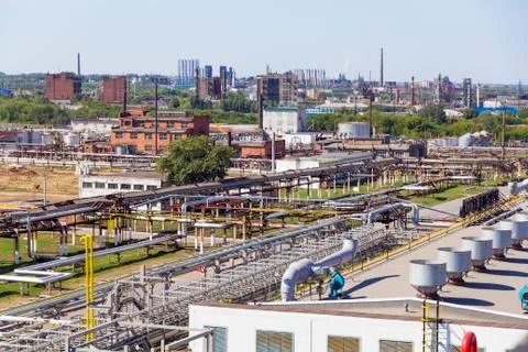 Big refinery complex at summer daylight Stock Photos