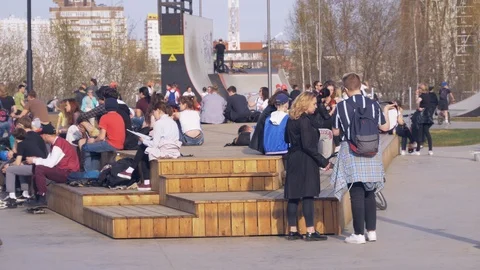 Big rest area. Park of active recreation for children and adults. Many Scooters Stock Footage 107776915